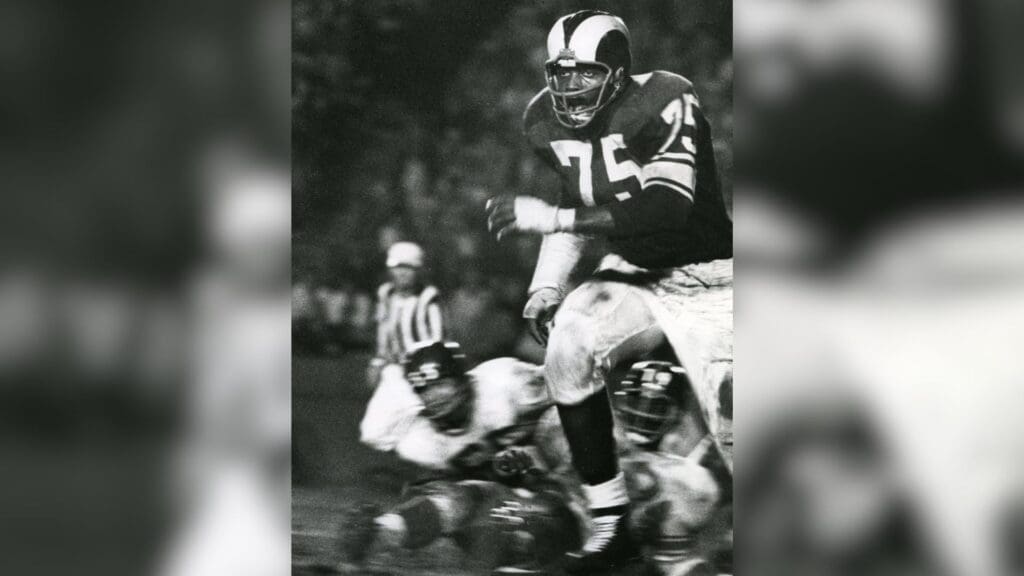 Aug 19, 1961; Los Angeles, CA, USA; FILE PHOTO; Los Angeles Rams defensive end Deacon Jones (75) in action against the New York Giants during his rookie in the pre-season at the Coliseum