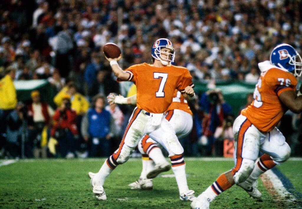 Jan 31, 1988; San Diego, CA, USA; FILE PHOTO; Denver Broncos quarterback (7) John Elway in action against the Washington Redskins in Super Bowl XXII at Jack Murphy Stadium. The Redskins defeated the Broncos 42-10.