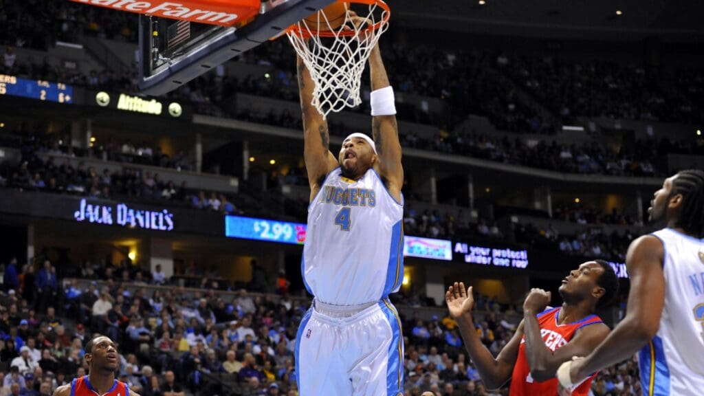 Jan 3, 2010; Denver, CO, USA; Denver Nuggets forward Kenyon Martin (4) dunks the basketball in the second period against the Philadelphia 76ers Denver Nuggets at the Pepsi Center.