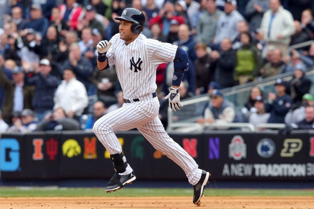 Apr 7, 2014; Bronx, NY, USA; New York Yankees shortstop Derek Jeter (2) runs out a double against the Baltimore Orioles during a game at Yankee Stadium.