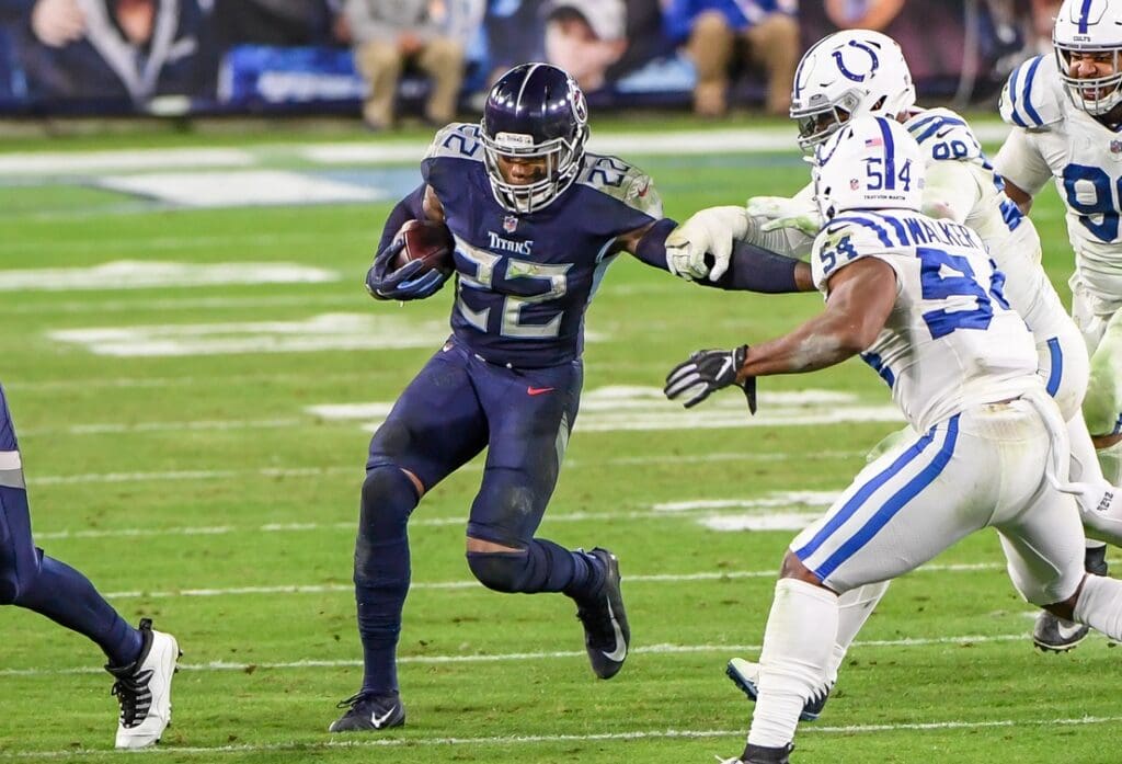 Nov 12, 2020; Nashville, Tennessee, USA; Tennessee Titans running back Derrick Henry (22) runs the ball against the Indianapolis Colts during the second half at Nissan Stadium.