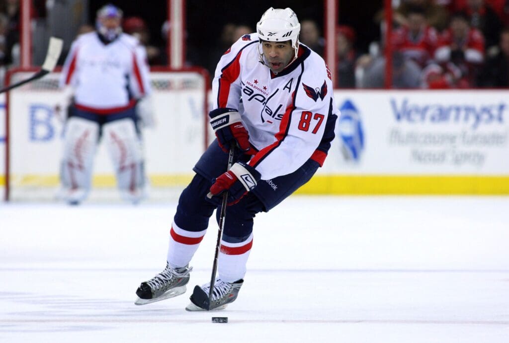 December 7, 2008; Raleigh, NC, USA; Washington Capitals left wing (87) Donald Brashear carries the puck against the Carolina Hurricanes at the RBC Center. The Hurricanes defeated the Capitals 3-1.