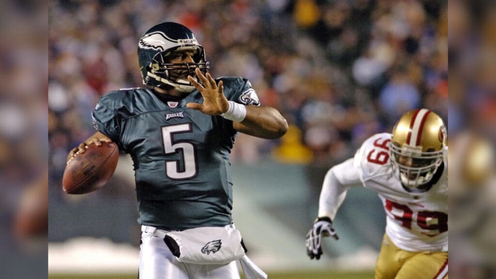 December 20, 2009; Philadelphia, PA USA; Philadelphia Eagles quarterback Donovan McNabb (5) gets away from San Francisco 49ers linebacker Manny Lawson (99) during the 1st half at Lincoln Financial Field in Philadelphia.
