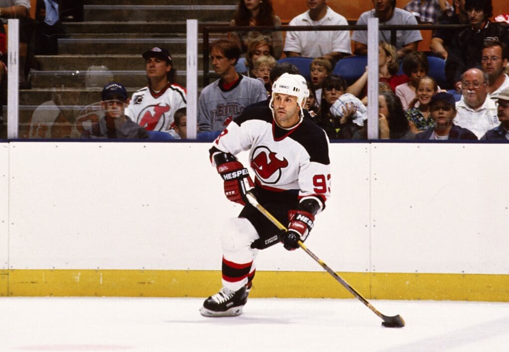 Sep 20, 1997; East Rutherford, NJ, USA; FILE PHOTO; New Jersey Devils center Doug Gilmour (93) in action against the New York Rangers at Continental Airlines Arena.