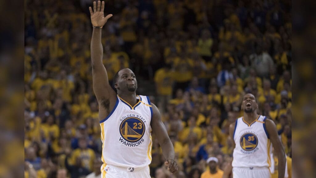 April 16, 2017; Oakland, CA, USA; Golden State Warriors forward Draymond Green (23) and forward Kevin Durant (35) celebrate against the Portland Trail Blazers during the fourth quarter in game one of the first round of the 2017 NBA Playoffs at Oracle Arena. The Warriors defeated the Trail Blazers 121-109.