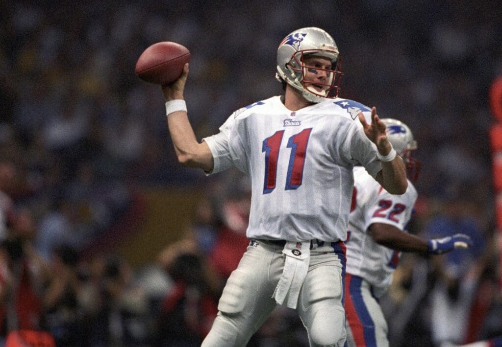 Jan 26, 1997; New Orleans, LA, USA; FILE PHOTO; New England Patriots quarterback Drew Bledsoe (11) in action against the Green Bay Packers during Super Bowl XXXI at the Superdome. The Packers defeated the Patriots 35-21.
