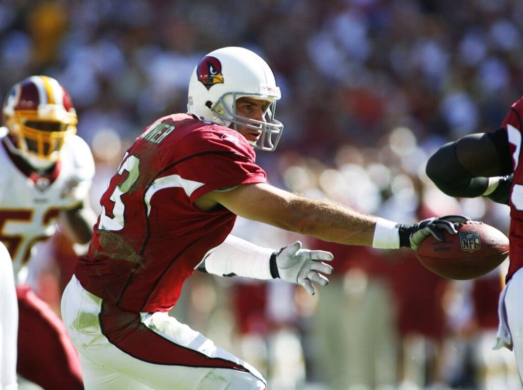 October 21, 2007; Landover, MD, USA; Due to an elbow injury, Arizona Cardinals quarterback Kurt Warner (13) hands off with his right hand against the Washington Redskins at FedEx Field in Landover, MD.