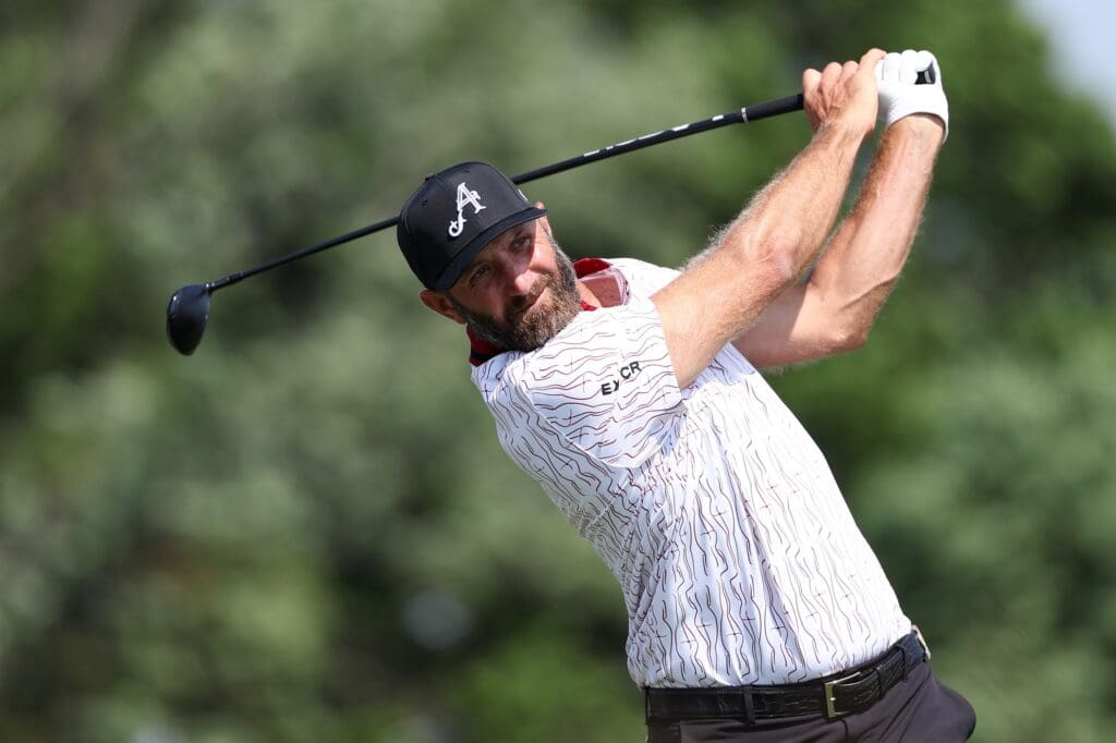 Jun 10, 2025; Oakmont, Pennsylvania, USA; Dustin Johnson plays his shot from the 16th tee during a practice round for the U.S. Open golf tournament at Oakmont Country Club.