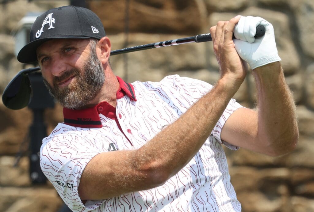 Jun 10, 2025; Oakmont, Pennsylvania, USA; Dustin Johnson plays a shot from the 11th tee during a practice round for the U.S. Open golf tournament at Oakmont Country Club.