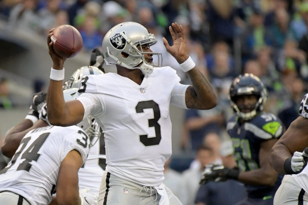 Aug 30, 2018; Seattle, WA, USA; Oakland Raiders quarterback EJ Manuel (3) throws a pass against the Seattle Seahawks during a preseason game at CenturyLink Field.