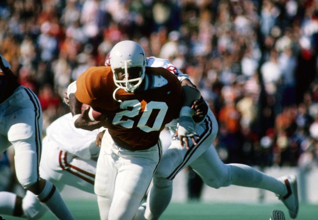 Oct 8, 1977; Dallas, TX, USA FILE PHOTO; Texas Longhorns running back Earl Campbell (20) carries the ball against the Oklahoma Sooners at the Cotton Bowl.