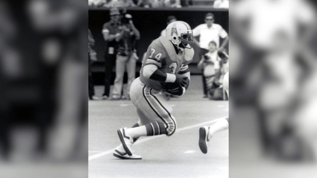 Unknown date; Cincinnati, OH; USA; FILE PHOTO; Houston Oilers running back Earl Campbell (34) runs with the ball against the Cincinnati Bengals at Riverfront Stadium.