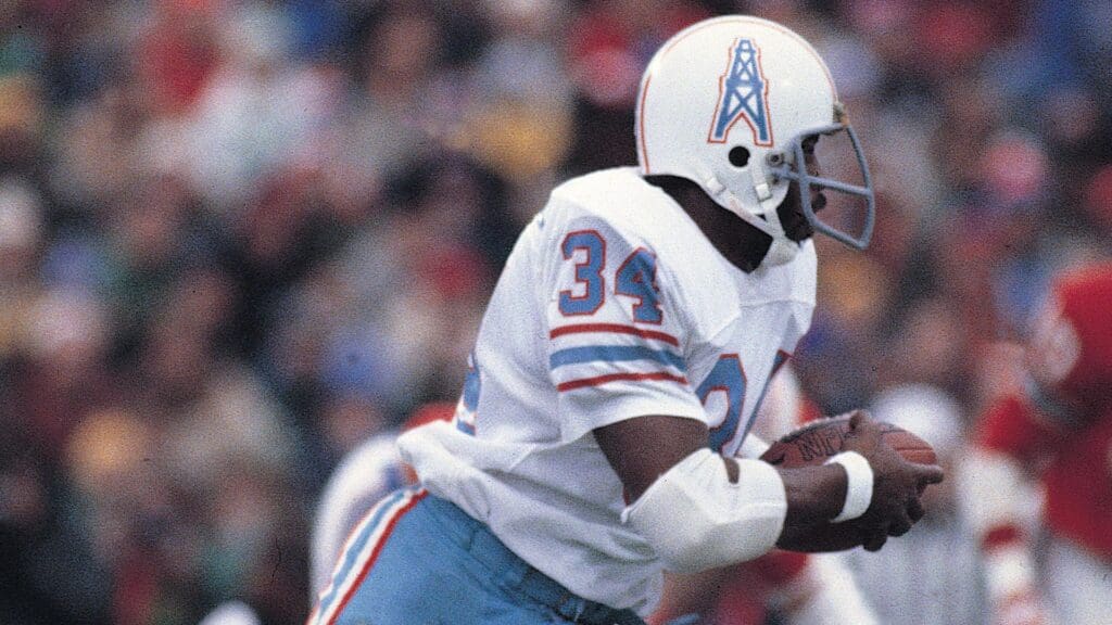 Nov 12, 1978; Foxboro, MA, USA; FILE PHOTO; Houston Oilers running back Earl Campbell (34) runs the ball against the New England Patriots at Foxboro Stadium. The Oilers beat the Patriots 26-23
