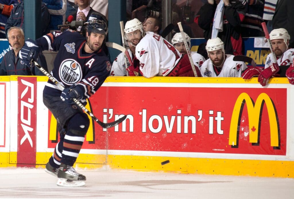 Jun 17, 2006; Edmonton, Alberta, CAN; Edmonton Oilers left wing Ethan Moreau (18) on the ice against the Carolina Hurricanes during game six of the Stanley Cup Finals at Rexall Place.