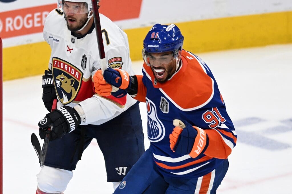 Jun 4, 2025; Edmonton, Alberta, CAN; Edmonton Oilers left wing Evander Kane (91) reacts after Edmonton Oilers defenseman Mattias Ekholm (not pictured) scores a goal against the Florida Panthers during the third period in game one of the 2025 Stanley Cup Final at Rogers Place.