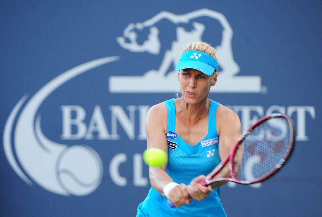 July 28, 2010; Stanford, CA, USA; Elena Dementieva (RUS) returns the ball against Kimiko Date Krumm (JPN), not pictured, in the second round play during the Bank of the West Classic women's tennis tournament at the Taube Family Tennis Stadium