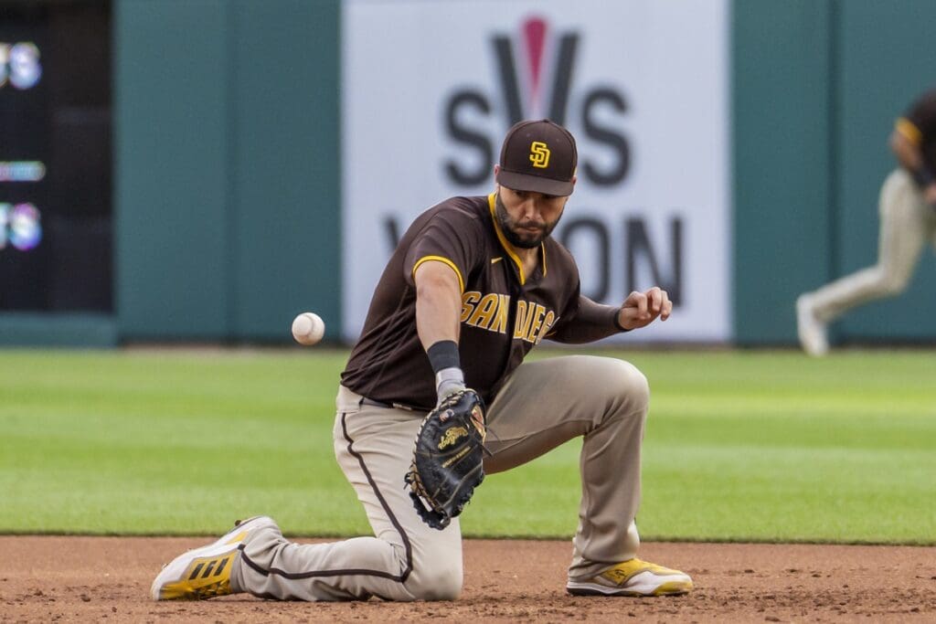Jul 25, 2022; Detroit, Michigan, USA; San Diego Padres first baseman Eric Hosmer (30) makes a fielding error during the third inning on a ground ball from Detroit Tigers first baseman Harold Castro (30) at Comerica Park.