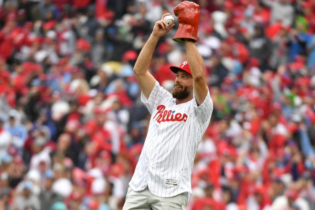 Oct 23, 2022; Philadelphia, Pennsylvania, USA; Former Philadelphia Phillies players Jayson Werth throws out the ceremonial first pitch before game five of the NLCS against the San Diego Padres for the 2022 MLB Playoffs at Citizens Bank Park.