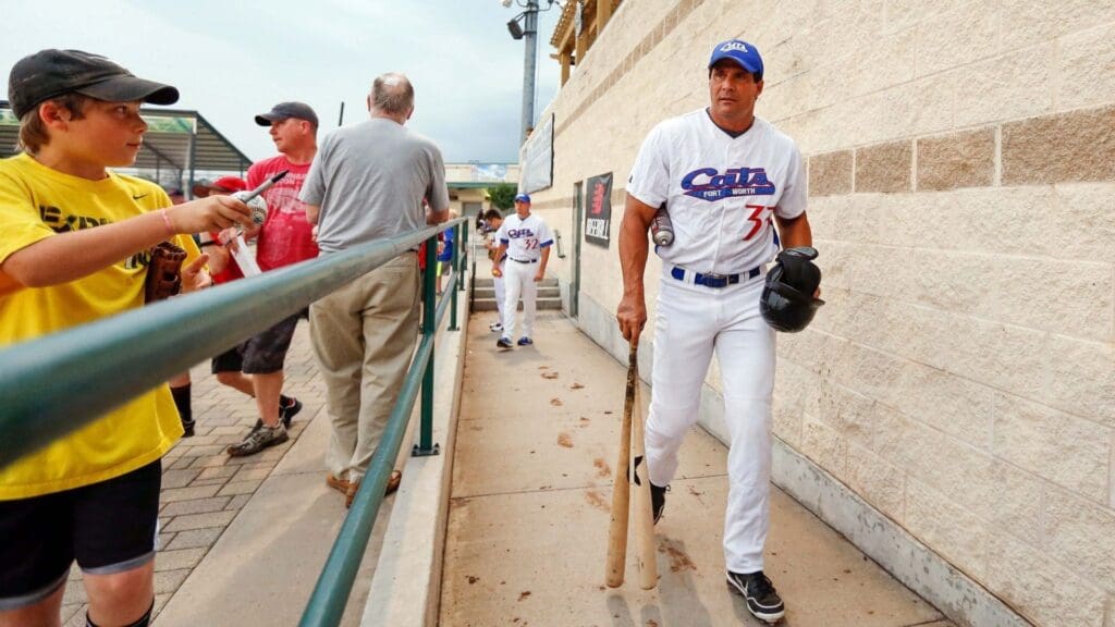 May 24, 2013; Fort Worth, TX, USA; Fort Worth Cats designated hitter Jose Canseco (33) walks out to the field before the game against the Edinburg Roadrunners at LaGrave Field.
