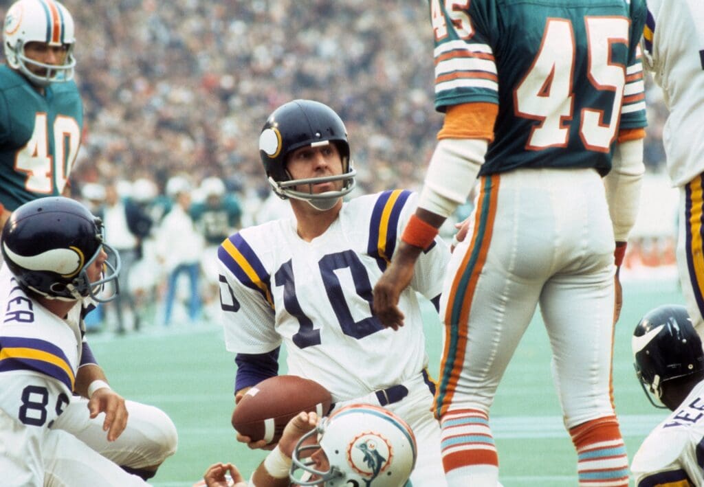 Jan 13, 1974; Houston, TX, USA; FILE PHOTO; Minnesota Vikings quarterback Fran Tarkenton (10) on the field after a play against the Miami Dolphins during Super Bowl VIII at Rice Stadium. Miami defeated Minnesota 24-7