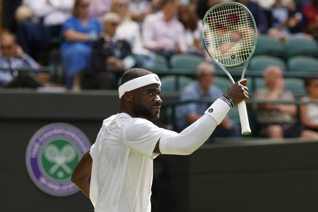 Jul 2, 2025; Wimbledon, United Kingdom; Frances Tiafoe (USA) reacts after winning a point against Cameron Norrie (GBR)(not pictured) on day three of The Championships Wimbledon 2025 at All England Lawn Tennis and Croquet Club.