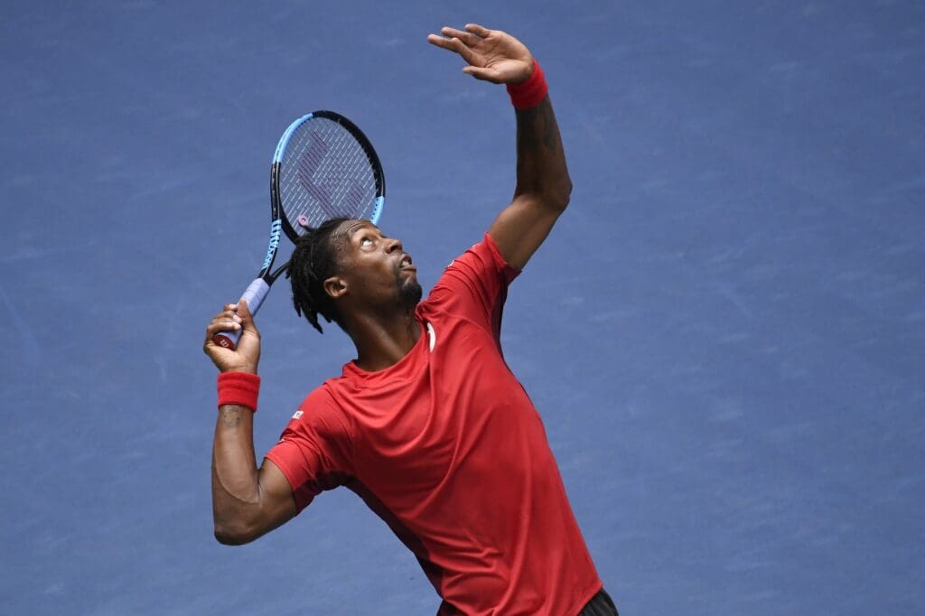 Sep 4, 2019; Flushing, NY, USA; Gael Monfils of France serves to Matteo Berrettini of Italy in the quarterfinals on day ten of the 2019 US Open tennis tournament at USTA Billie Jean King National Tennis Center.
