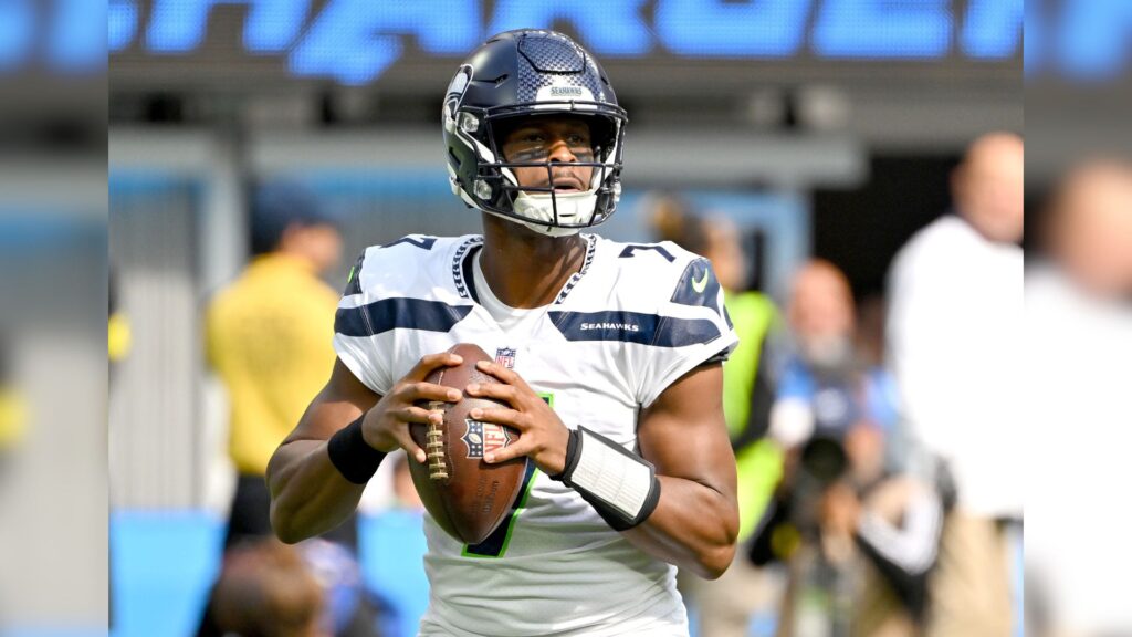 Oct 23, 2022; Inglewood, California, USA; Seattle Seahawks quarterback Geno Smith (7) sets to pass the ball in the first half against the Los Angeles Chargers at SoFi Stadium.