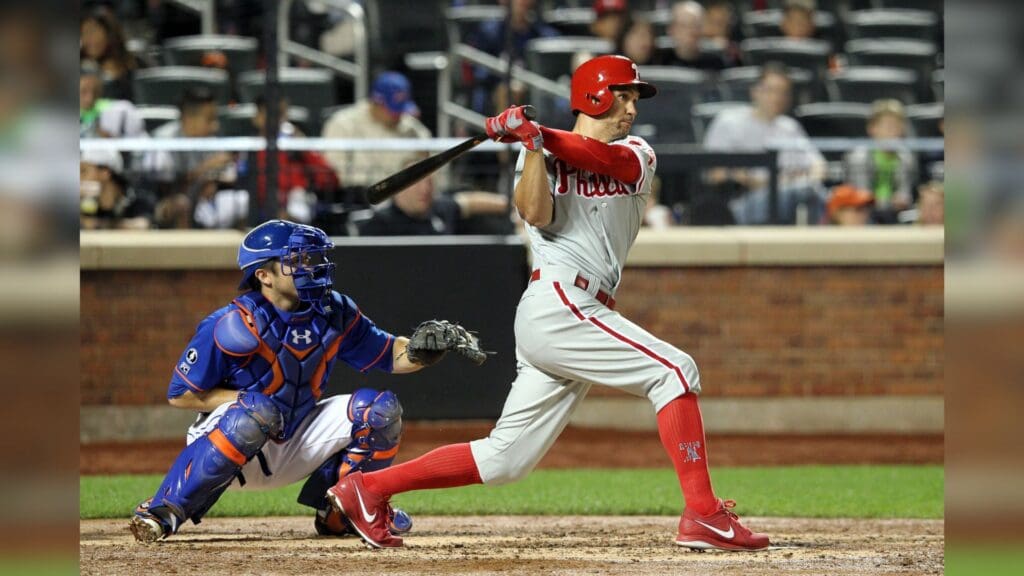 Aug 29, 2014; New York, NY, USA; Philadelphia Phillies left fielder Grady Sizemore (24) hits a single against the New York Mets during the fifth inning of a game at Citi Field.