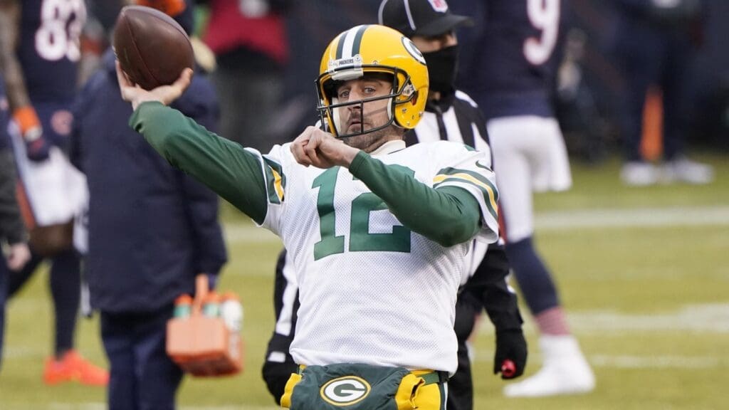 Jan 3, 2021; Chicago, Illinois, USA; Green Bay Packers quarterback Aaron Rodgers (12) warms up before the game against the Chicago Bears at Soldier Field.