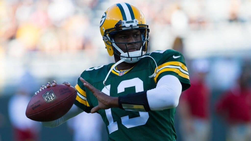Aug 9, 2013; Green Bay, WI, USA; Green Bay Packers quarterback Vince Young (13) during warmups prior to the game against the Arizona Cardinals at Lambeau Field. The Cardinals won 17-0