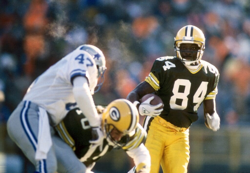 Dec 22, 1990; Milwaukee, WI, USA; Green Bay Packers receiver Sterling Sharpe (84) in action against the Dallas Cowboys at Milwaukee County Stadium.