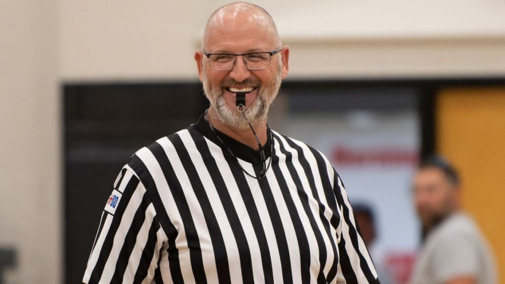Greg Ostertag comes back on the court as an official during The Rock Chalk Roundball Classic Thursday, July. 10, 2025 at Free State High School.
