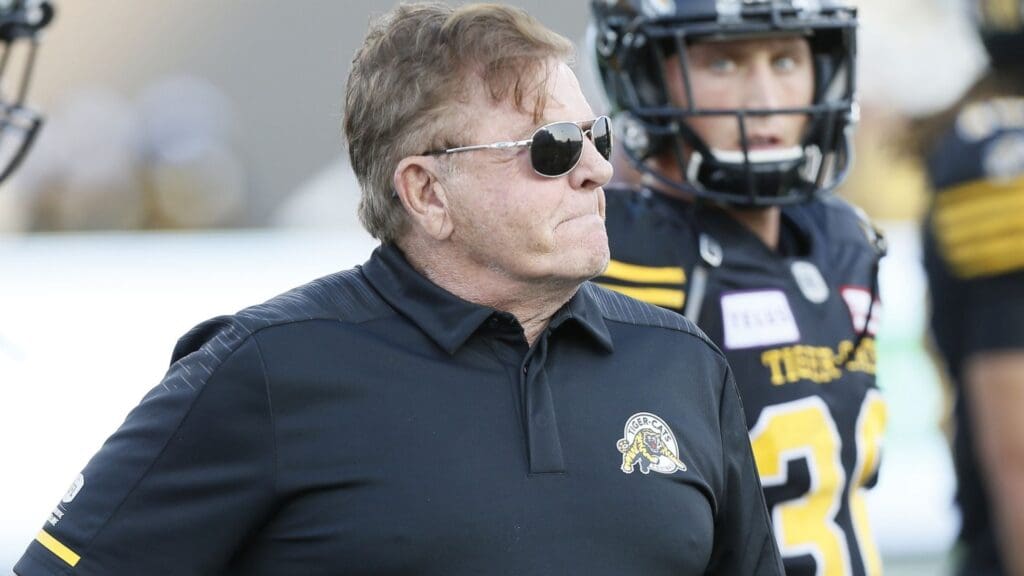 Aug 23, 2018; Hamilton, Ontario, CAN; Hamilton Tiger-Cats defensive coordinator Jerry Glanville during warm up against the Edmonton Eskimos during a Canadian Football League game at Tim Hortons Field.