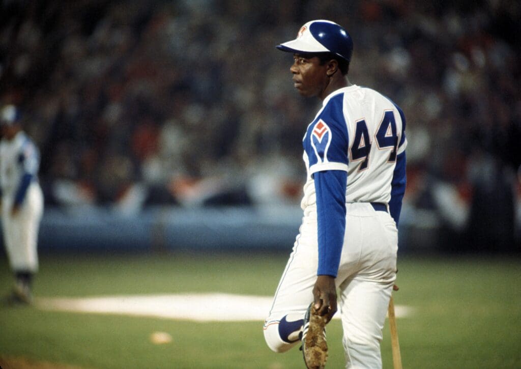 Apr 8, 1974; Atlanta, GA, USA; FILE PHOTO; Atlanta Braves outfielder Hank Aaron (44) stands on deck the evening he broke the all-time career home run record previously held by Babe Ruth at Fulton County Stadium against the Los Angeles Dodgers.