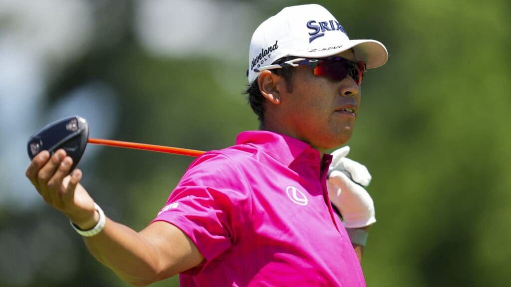 Jun 28, 2025; Detroit, Michigan, USA; Hideki Matsuyama reacts to his shot on the second tee during the third round of the Rocket Mortgage Classic golf tournament.