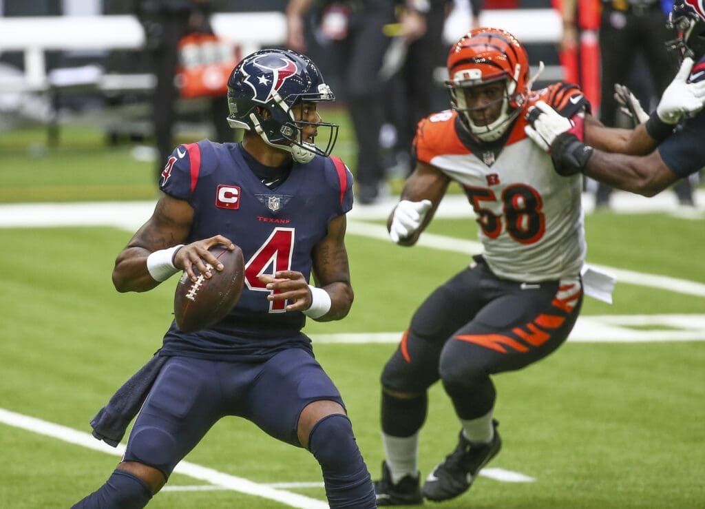 Dec 27, 2020; Houston, Texas, USA; Houston Texans quarterback Deshaun Watson (4) looks for an open receiver against the Cincinnati Bengals during the second quarter at NRG Stadium. 