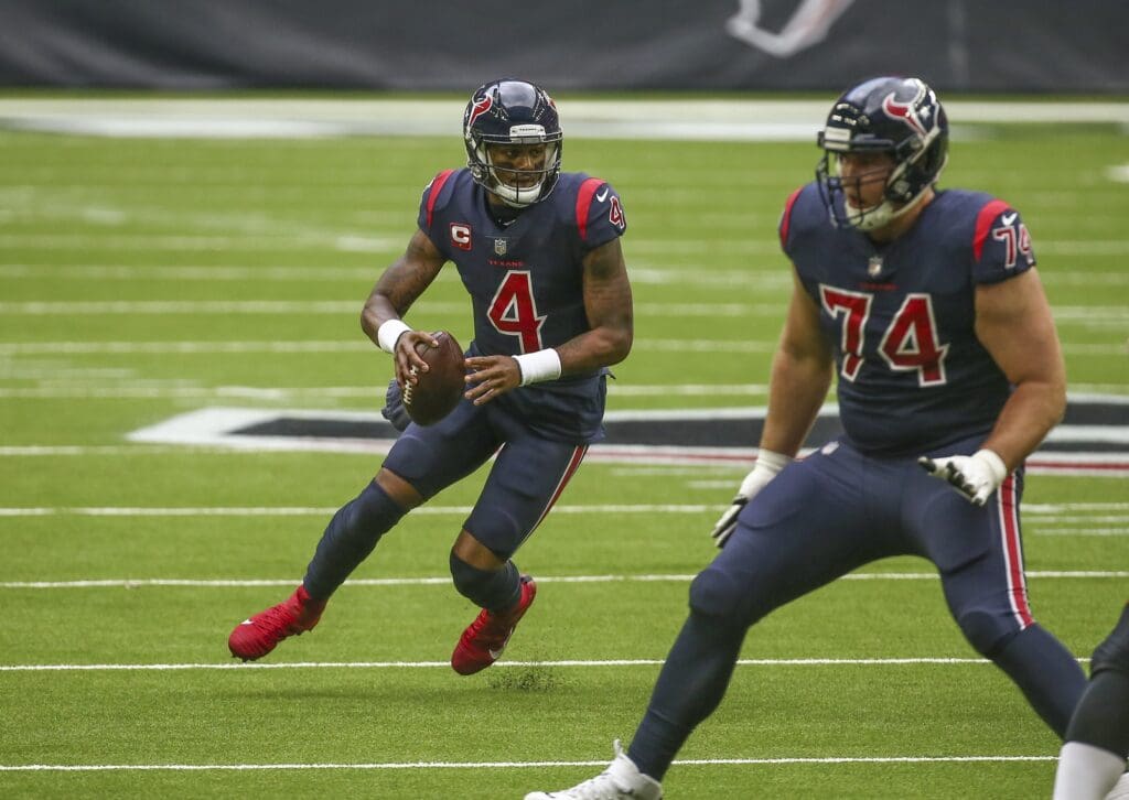 Dec 27, 2020; Houston, Texas, USA; Houston Texans quarterback Deshaun Watson (4) runs the ball against the Cincinnati Bengals during the second quarter at NRG Stadium.