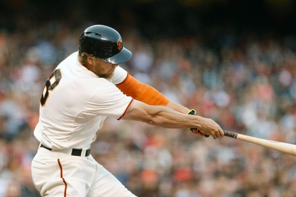 Aug 12, 2014; San Francisco, CA, USA; San Francisco Giants right fielder Hunter Pence (8) hits a triple against the Chicago White Sox during the first inning at AT&T Park.