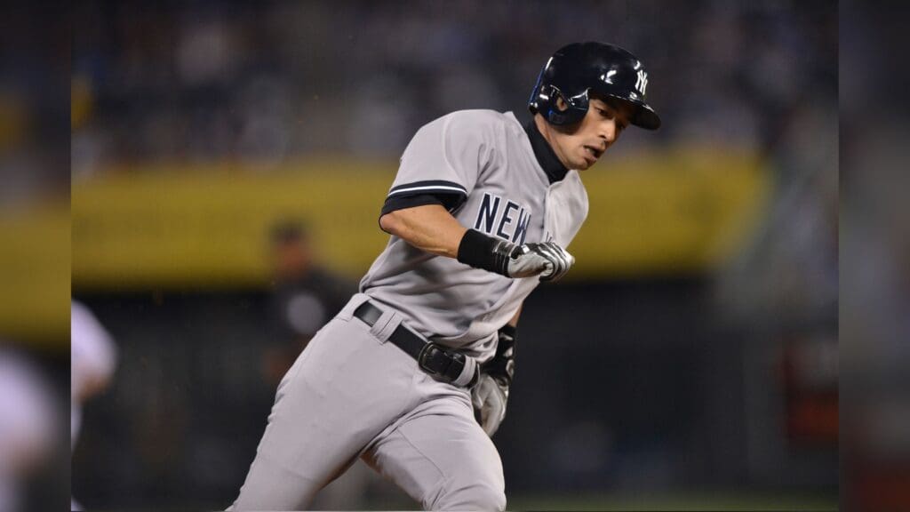 May 10, 2013; Kansas City, MO, USA; New York Yankees right fielder Ichiro Suzuki (31) rounds third to score against the Kansas City Royals during the ninth inning at Kauffman Stadium.