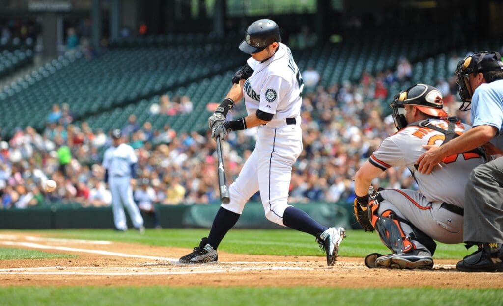 May 30, 2011; Seattle, WA, USA; Seattle Mariners right fielder Ichiro Suzuki (51) hits a single against the Baltimore Orioles in the 1st inning at Safeco Field.