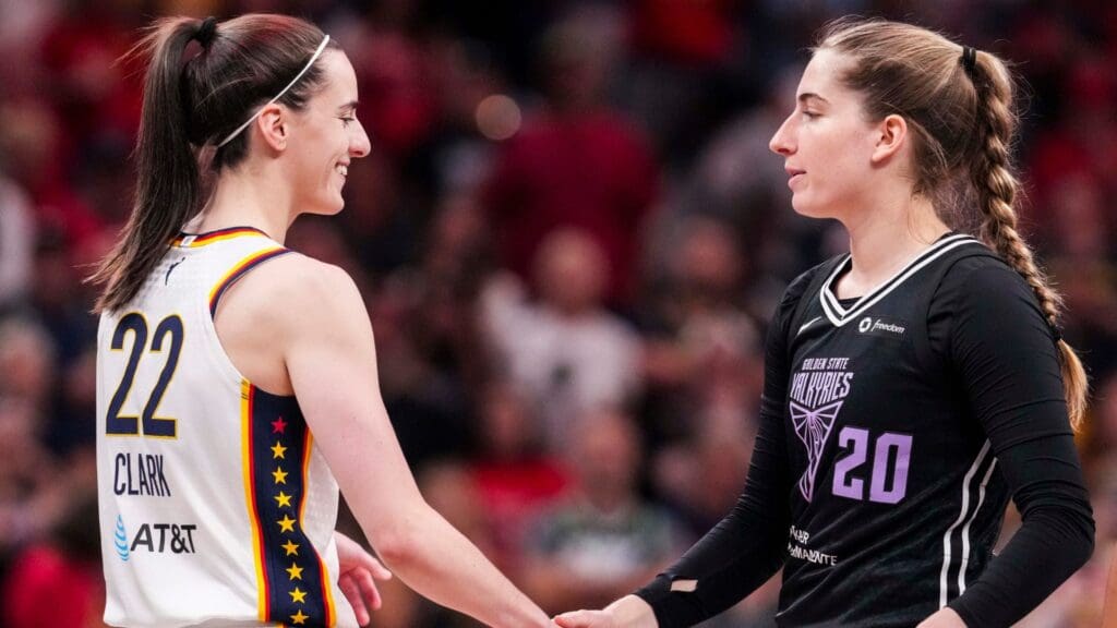 Indiana Fever guard Caitlin Clark (22) greets Golden State Valkyries guard Kate Martin (20) on Wednesday, July 9, 2025, during a game between the Indiana Fever and the Golden State Valkyries at Gainbridge Fieldhouse in Indianapolis.