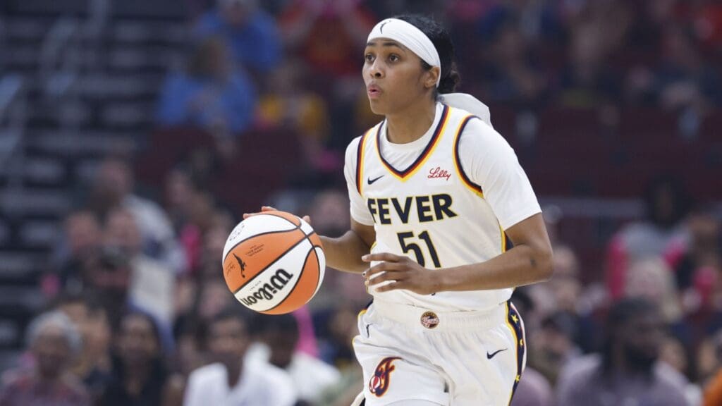 Jul 27, 2025; Chicago, Illinois, USA; Indiana Fever guard Sydney Colson (51) brings the ball up court against the Chicago Sky during the first half at United Center. 