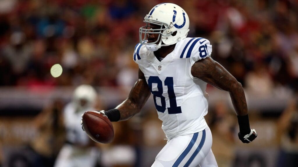 Aug 29, 2015; St. Louis, MO, USA; Indianapolis Colts wide receiver Andre Johnson (81) scores a touchdown during the first quarter of a football game against the St. Louis Rams at the Edward Jones Dome.