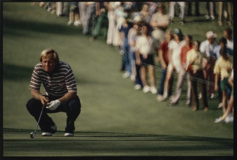 4/9/1981; Augusta, Georgia, USA; Jack Nicklaus lines up shot with spectators in background at Augusta National GC during the 1981 Masters.