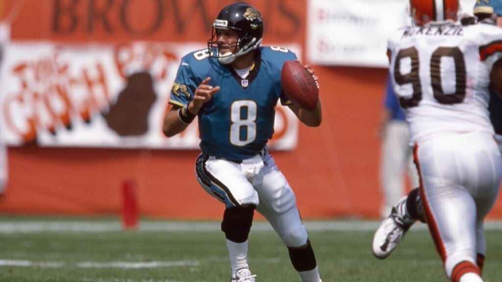 Sep 3, 2000; Cleveland, OH, USA; Jacksonville Jaguars quarterback Mark Brunell (8) throws in the pocket against the Cleveland Browns at Cleveland Browns Stadium. The Jaguars beat the Browns 27-7. 