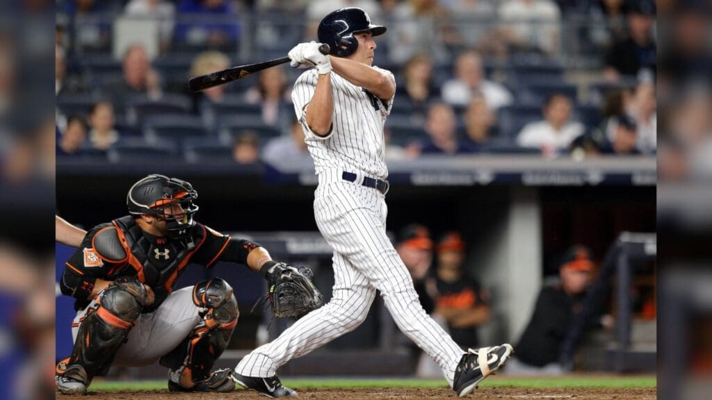 Apr 28, 2017; Bronx, NY, USA; New York Yankees center fielder Jacoby Ellsbury (22) follows through on a grand slam against the Baltimore Orioles during the seventh inning at Yankee Stadium.