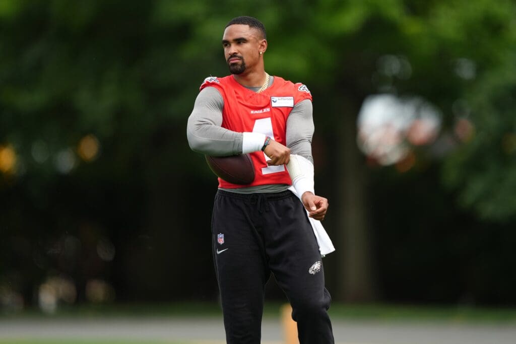 Jun 10, 2025; Philadelphia, PA, USA; Philadelphia Eagles quarterback Jalen Hurts (1) looks on during a practice drill at NovaCare Complex.