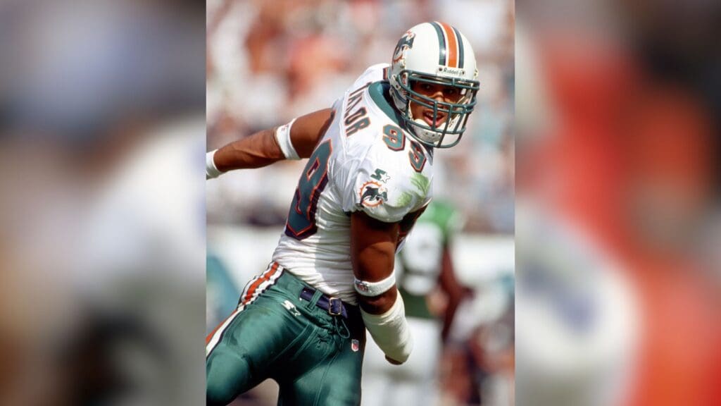 Nov 9, 1997; Miami, FL, USA; FILE PHOTO; Miami Dolphins defensive end Jason Taylor reacts to a play against the New York Jets at Pro Player Stadium.