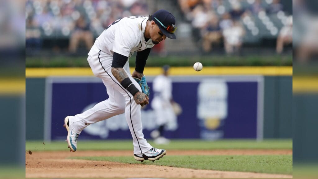 Jun 26, 2025; Detroit, Michigan, USA; Detroit Tigers shortstop Javier Baez (28) cant make the play in the third inning against the Athletics at Comerica Park.