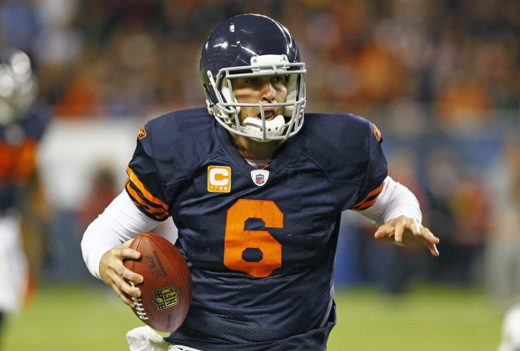 Sep 27, 2010; Chicago, IL, USA; Chicago Bears quarterback Jay Cutler (6) runs the ball against the Green Bay Packers during the second half at Soldier Field. The Chicago Bears defeat the Green Bay Packers 20-17.